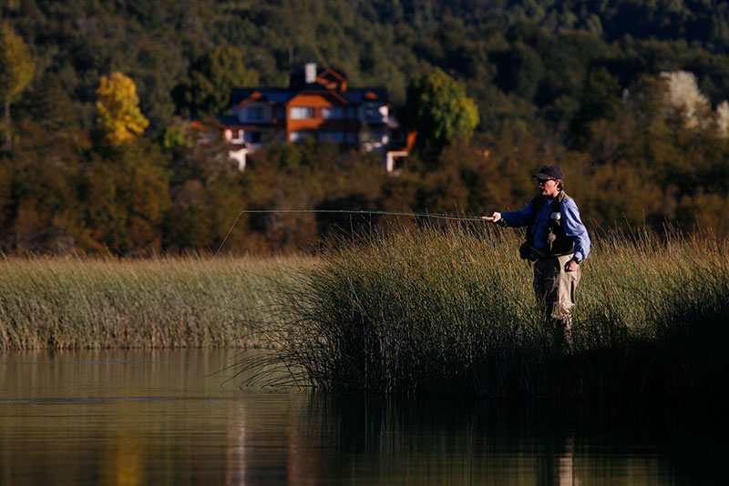 Angler fly fishing Rio Manso channels