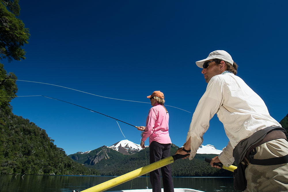 Flyfisherwoman casting Lago Fonck & Andes